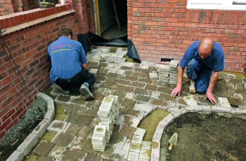 Marshalls Approved Men Laying Paving